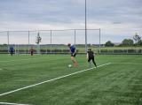 Laatste training S.K.N.W.K. JO11-1JM (partijtje tegen de ouders) van maandag 27 mei 2024 (88/137)